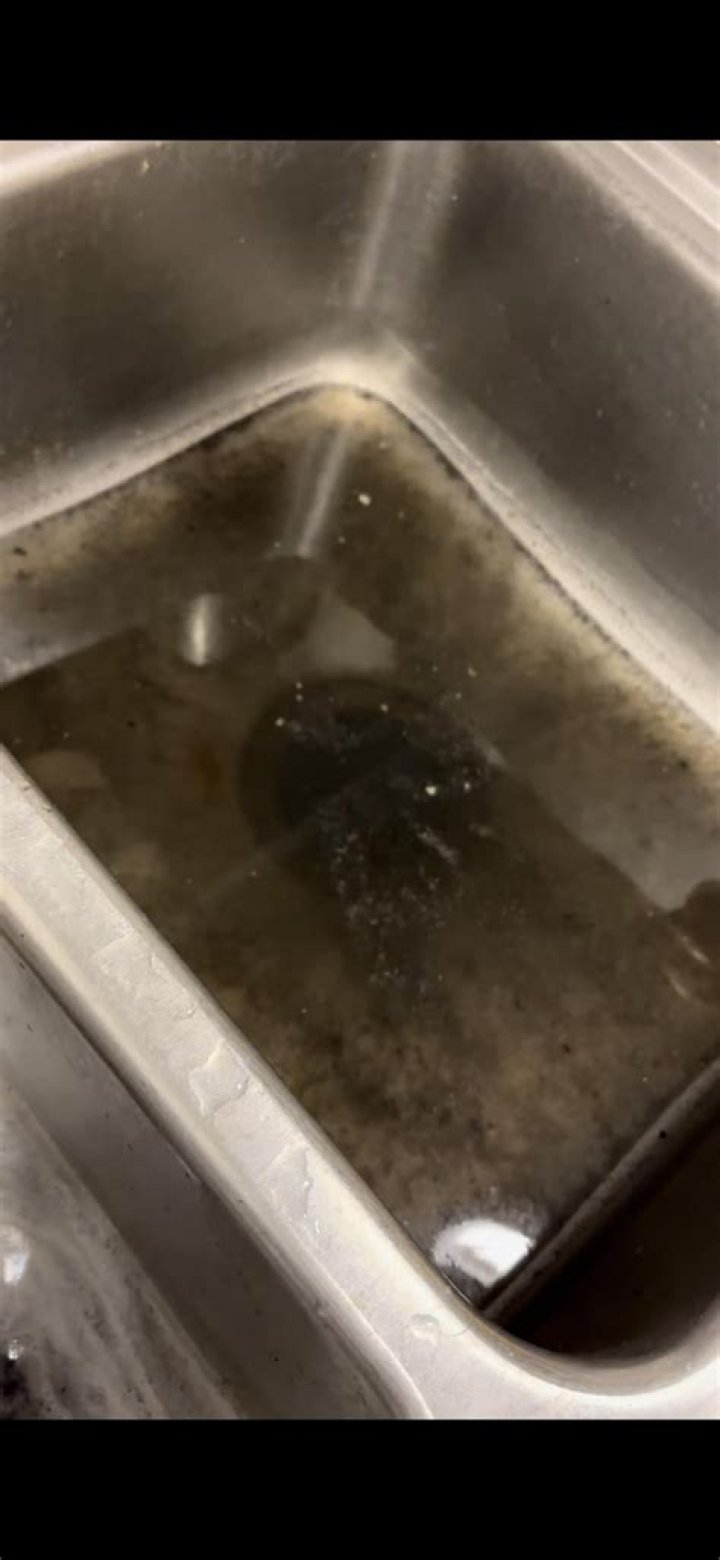 black water in sink