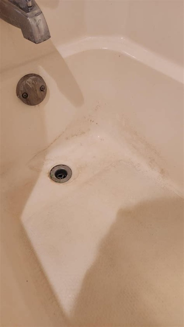 calcium buildup in bathtub