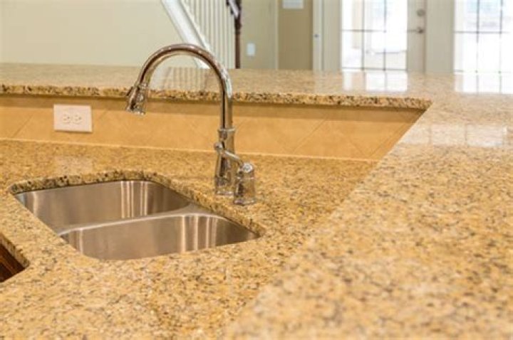 cloudy film on granite countertop