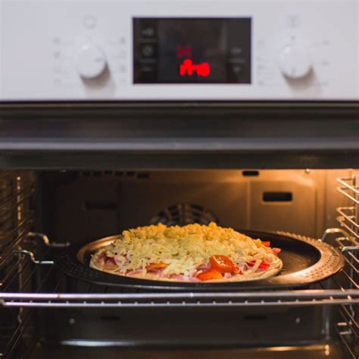 frozen pizza in convection oven