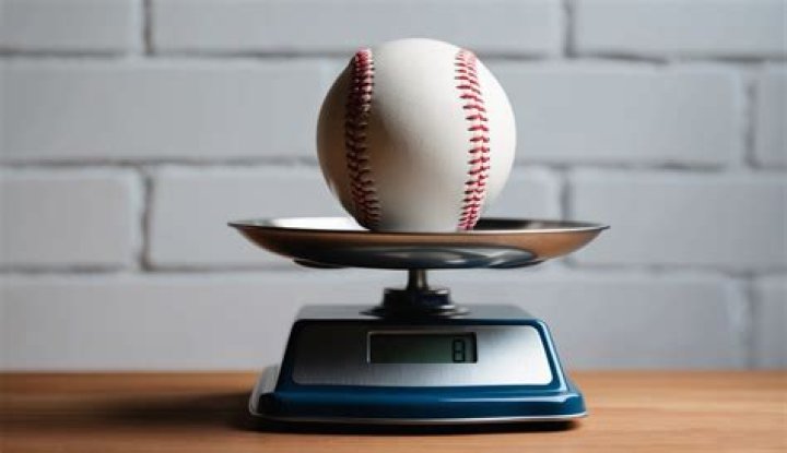 how much does a baseball weigh
