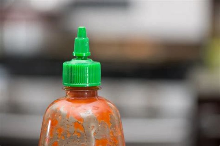 how to get sriracha out of clothes