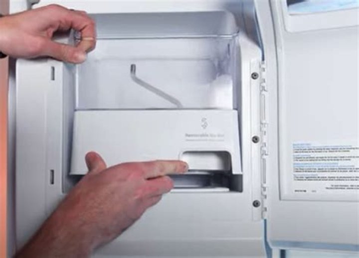 how to remove ice bin from whirlpool refrigerator