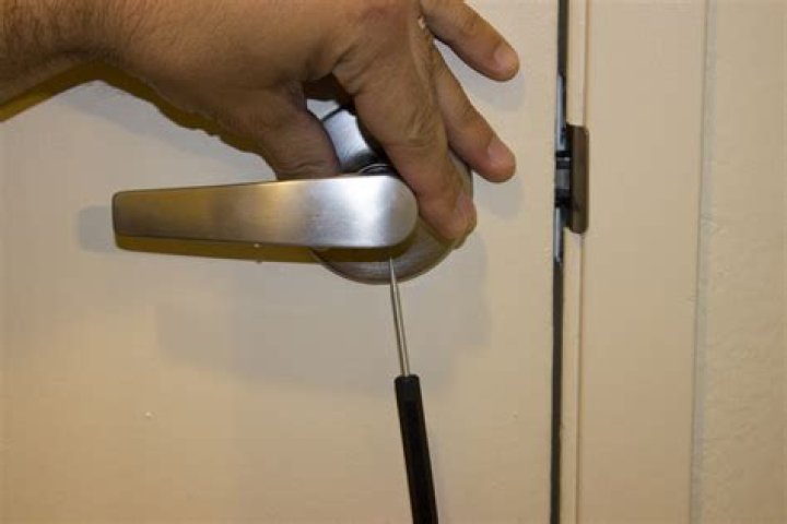 how to remove lever door handle