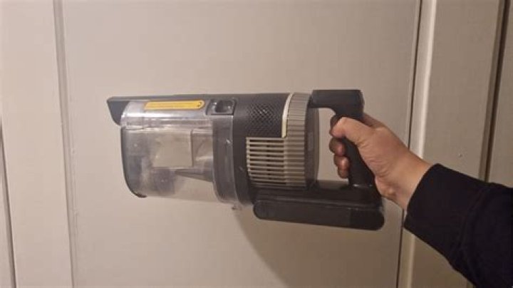 how to remove shark vacuum canister