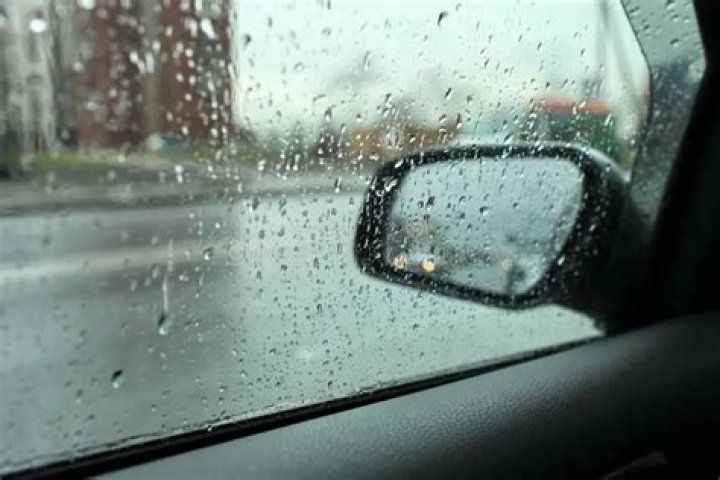 left car window open in rain