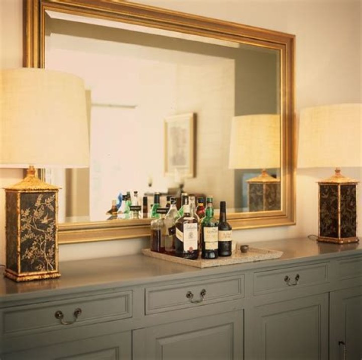 mirror above sideboard