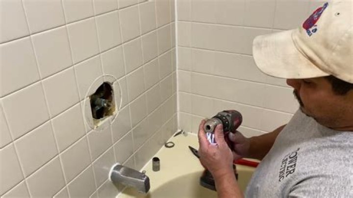 remove moen shower cartridge