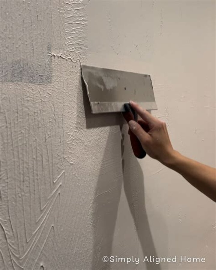 skim coating brick wall