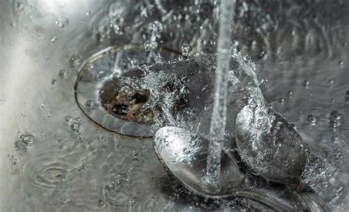 spoon stuck in garbage disposal