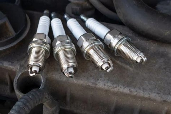 symptoms of over tightened spark plugs