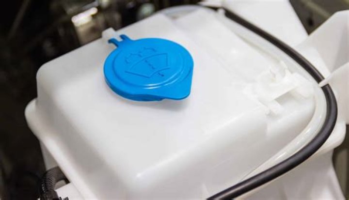 where is the rear window washer fluid container nissan rogue